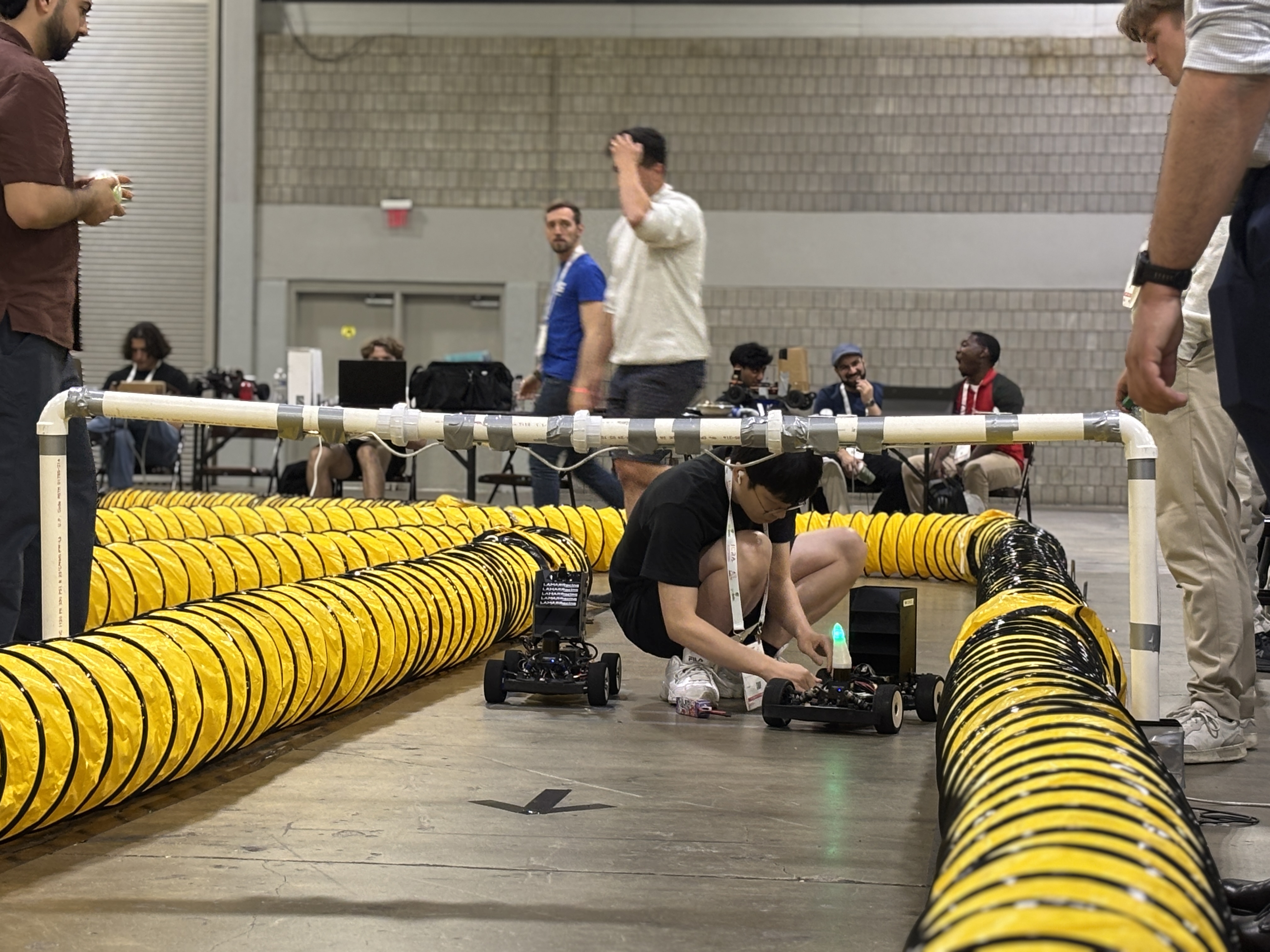 Team UNICORN is preparing for an autonomous racing event. This racing vehicle features a 3D-printed horn with LEDs installed, allowing real-time monitoring of the vehicle's status.